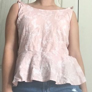 Pink tank top with white floral detail